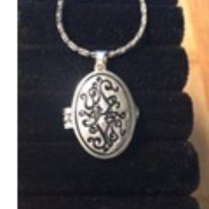 Silver tone locket